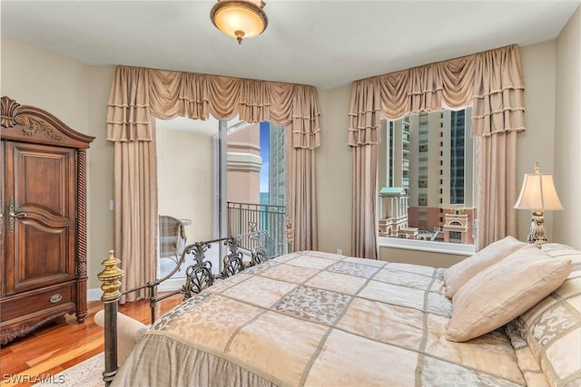 bedroom featuring hardwood / wood-style floors