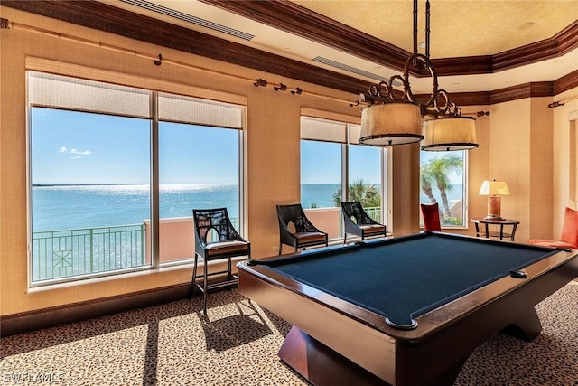 playroom featuring pool table, ornamental molding, and a water view