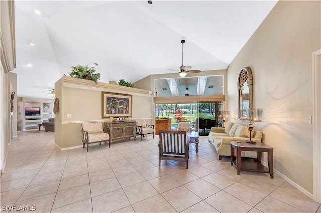 living room featuring light tile patterned floors, baseboards, high vaulted ceiling, and a ceiling fan