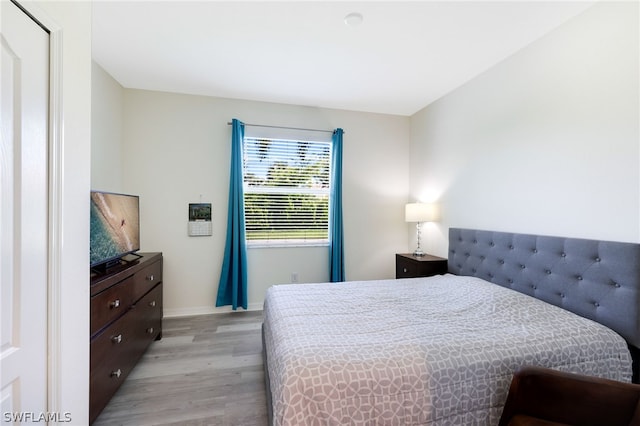 bedroom featuring light hardwood / wood-style flooring