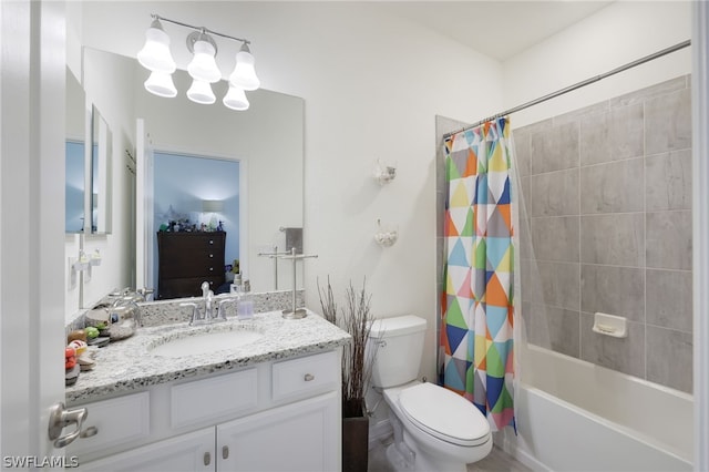 full bathroom featuring toilet, vanity, and shower / bath combination with curtain