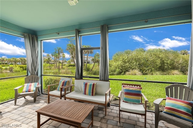 sunroom / solarium featuring plenty of natural light