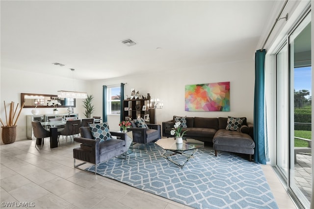 living room featuring a chandelier