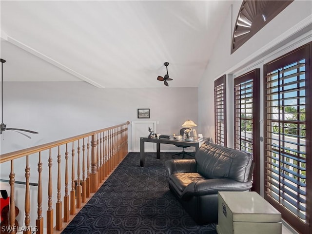 interior space with ceiling fan and lofted ceiling