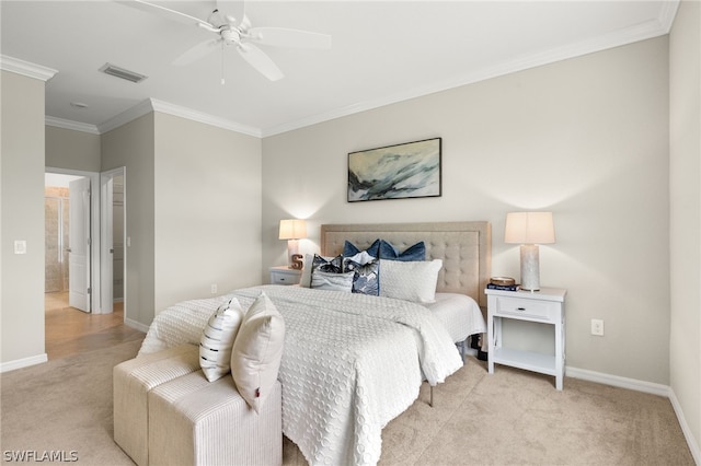 bedroom with light carpet, ceiling fan, and crown molding