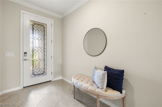 entrance foyer with light tile patterned flooring and ornamental molding