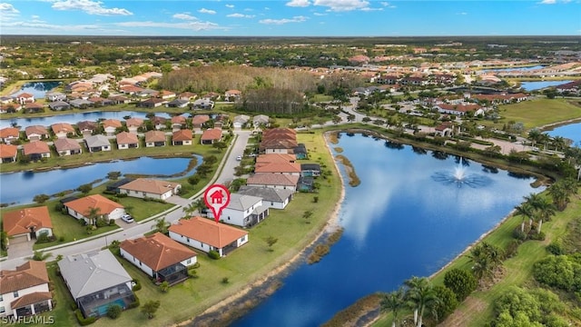 drone / aerial view featuring a water view