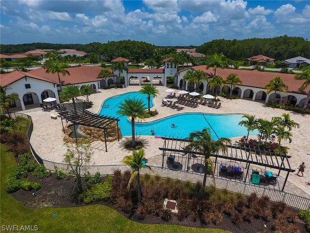 view of pool featuring a patio