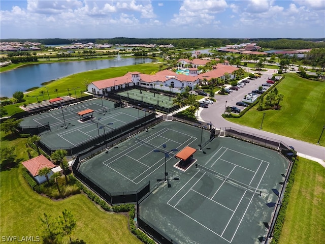 drone / aerial view with a water view