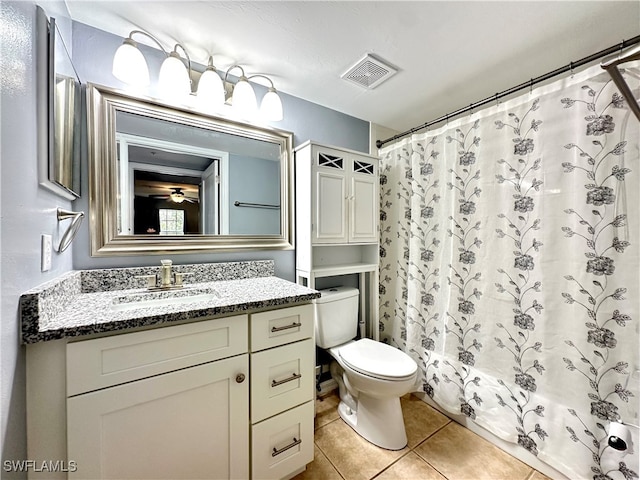 full bathroom with vanity, tile patterned flooring, shower / bath combo, and toilet