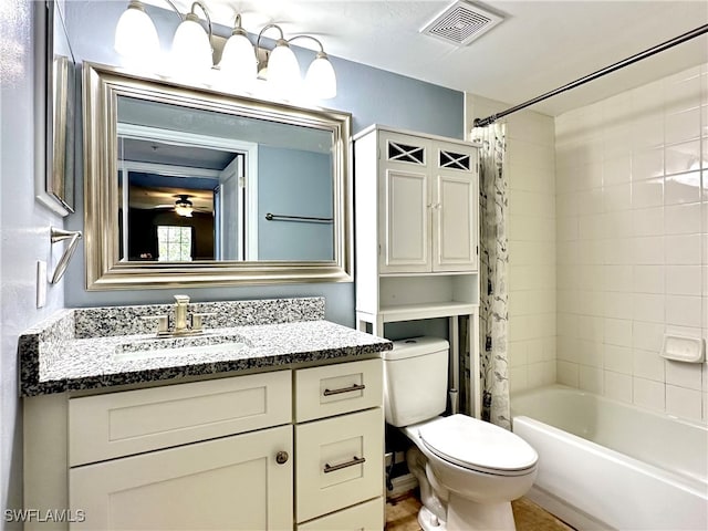 full bathroom with shower / bath combination with curtain, vanity, and toilet