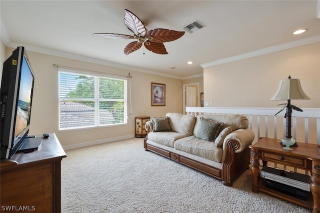 living room featuring carpet flooring, ceiling fan, and crown molding