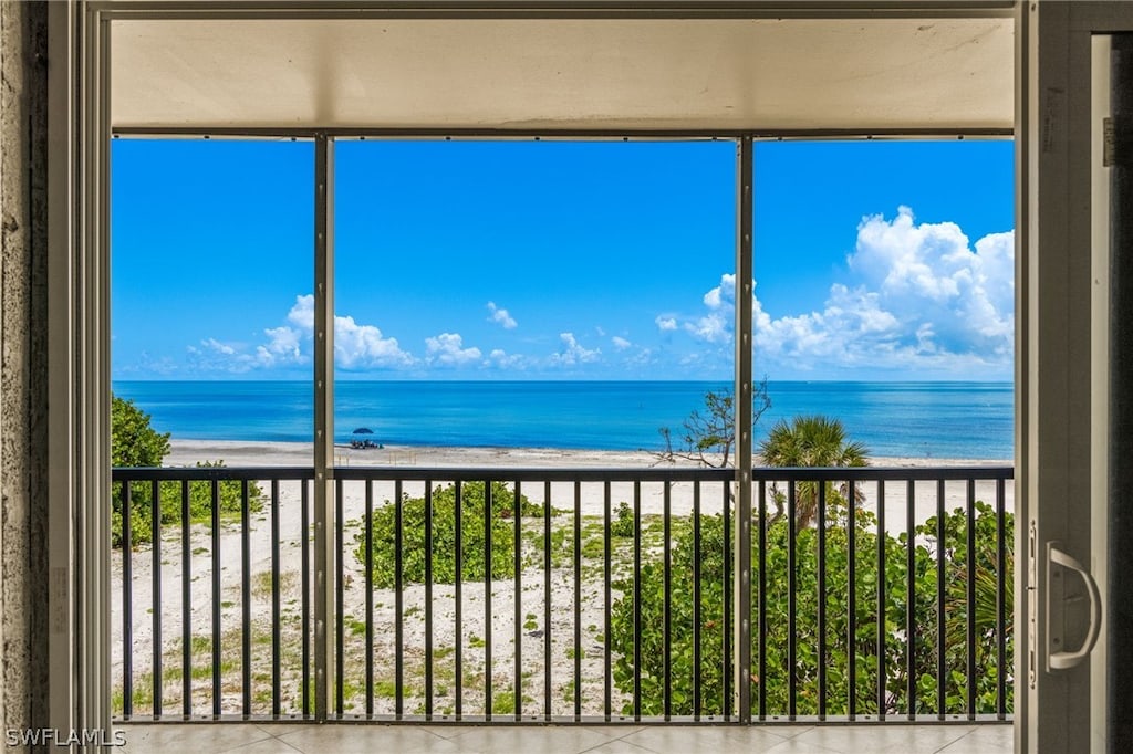 property view of water featuring a beach view