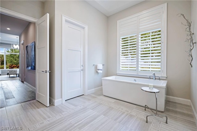 bathroom featuring a bath