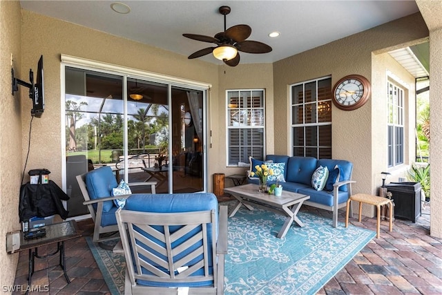 view of patio with an outdoor hangout area and ceiling fan