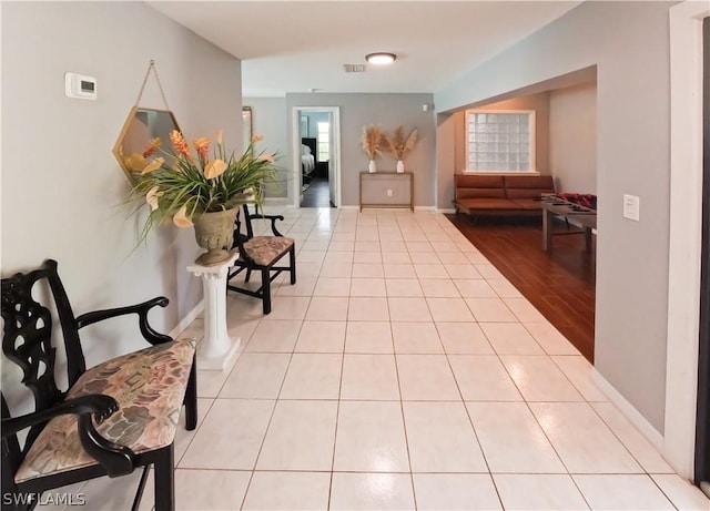 hallway with light tile patterned flooring