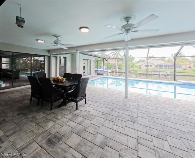 view of pool with ceiling fan