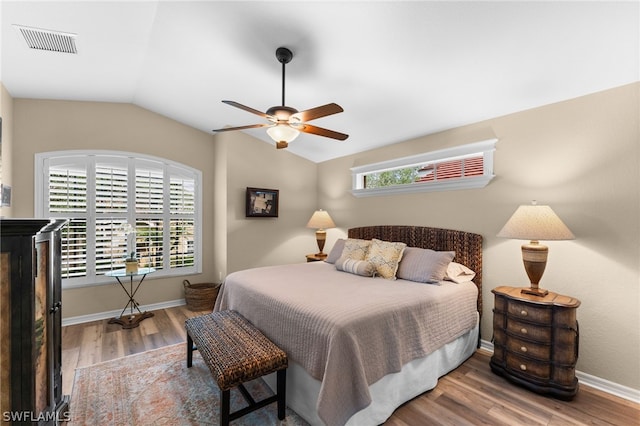 20331 Calice Ct Unit 1704, Estero, FL 33928 - bedroom with wood finished floors, lofted ceiling, ceiling fan, and baseboards