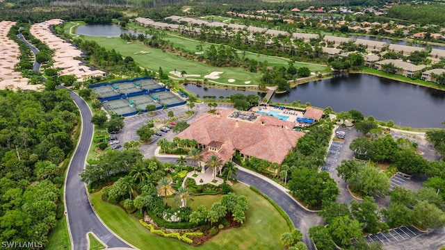 drone / aerial view featuring a water view and golf course view