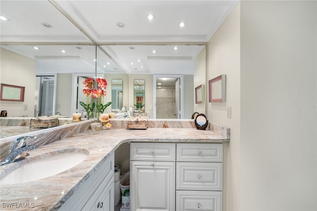 bathroom featuring vanity and walk in shower