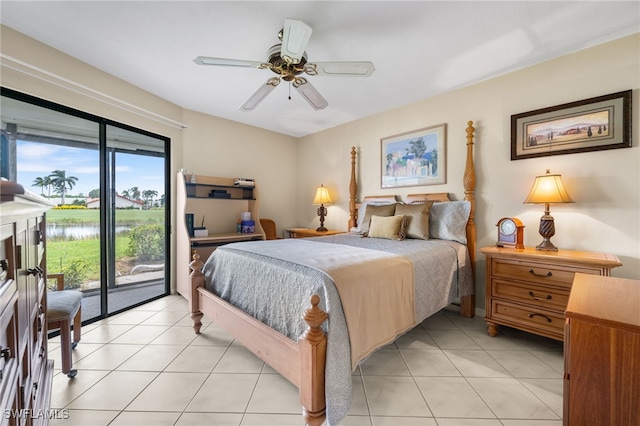 tiled bedroom with access to outside and ceiling fan