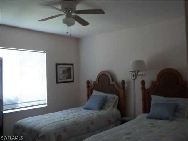 bedroom featuring ceiling fan