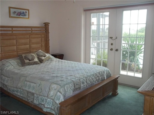 carpeted bedroom featuring french doors