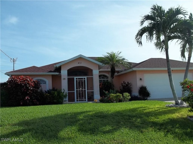 ranch-style home with a garage and a front yard