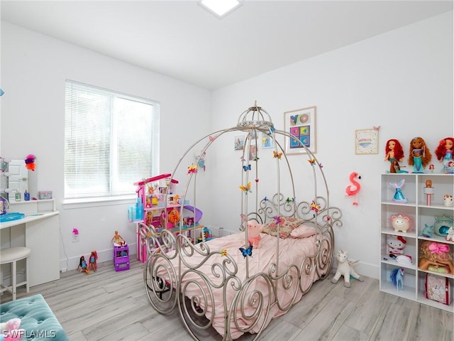 bedroom featuring light hardwood / wood-style floors