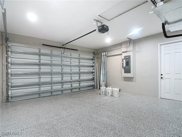 garage featuring a garage door opener and electric panel