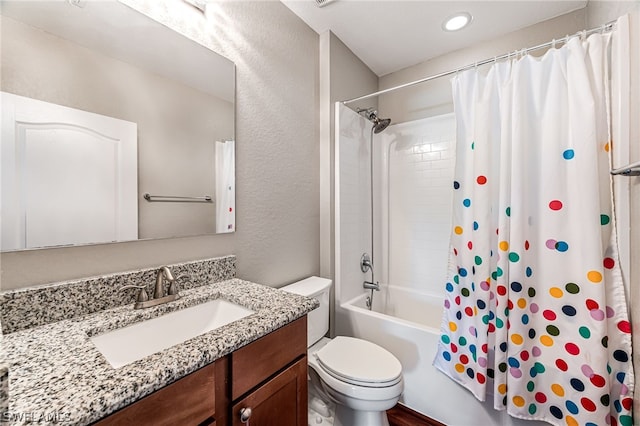 full bathroom with toilet, vanity, and shower / bathtub combination with curtain