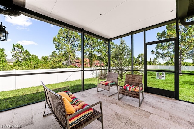 sunroom featuring a wealth of natural light