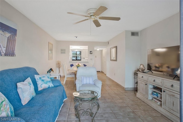 living room with ceiling fan