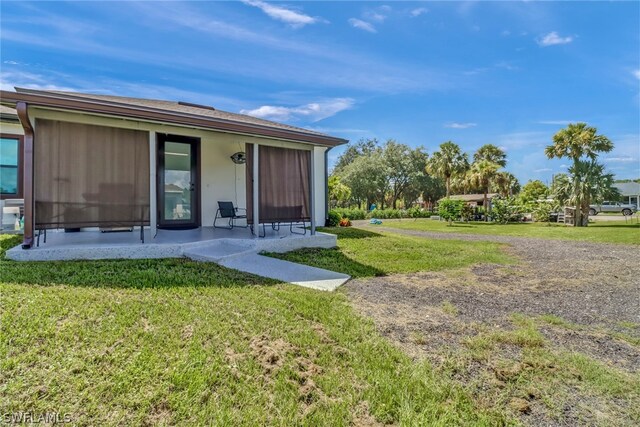 exterior space featuring a yard