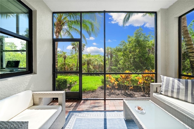 unfurnished sunroom with a wealth of natural light