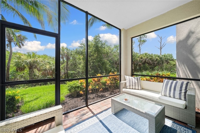 unfurnished sunroom featuring a healthy amount of sunlight