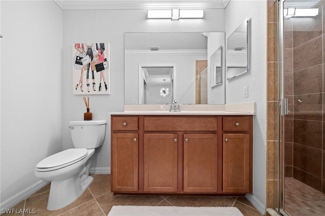 bathroom featuring vanity, toilet, tile patterned flooring, and crown molding