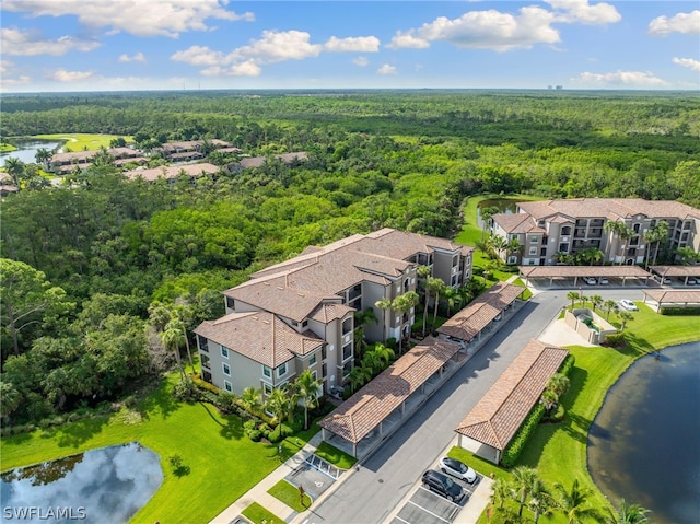 bird's eye view with a water view