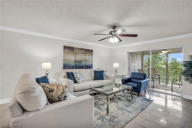 living area with baseboards, a textured ceiling, ceiling fan, and crown molding