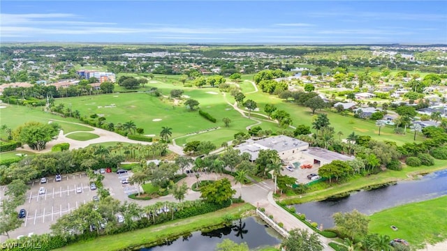 aerial view featuring a water view and golf course view