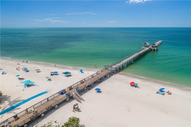 aerial view featuring a water view and a view of the beach