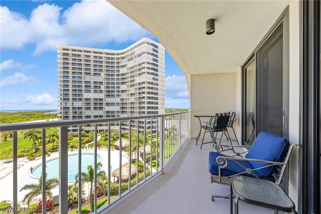 balcony with a community pool