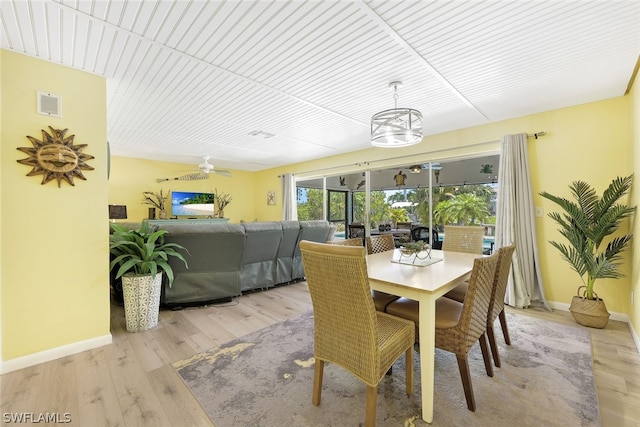 dining area with light wood-type flooring