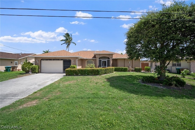 view of front of house featuring a front lawn and a garage