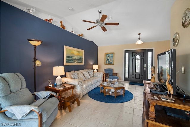 tiled living room featuring lofted ceiling and ceiling fan