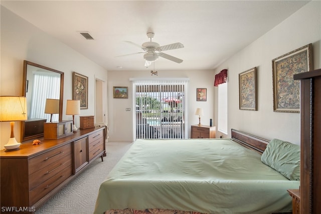 carpeted bedroom featuring ceiling fan and access to exterior