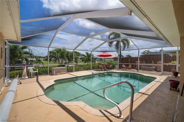 view of pool featuring a patio area and a lanai