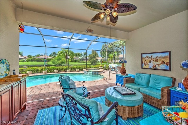 view of swimming pool featuring ceiling fan, a lanai, an outdoor living space, an in ground hot tub, and a patio