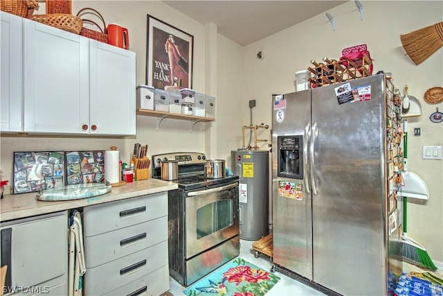 kitchen with white cabinetry, water heater, and appliances with stainless steel finishes