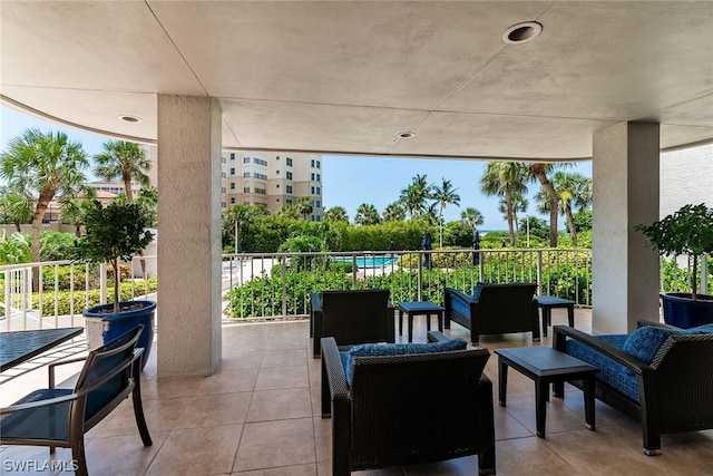 view of patio featuring a balcony